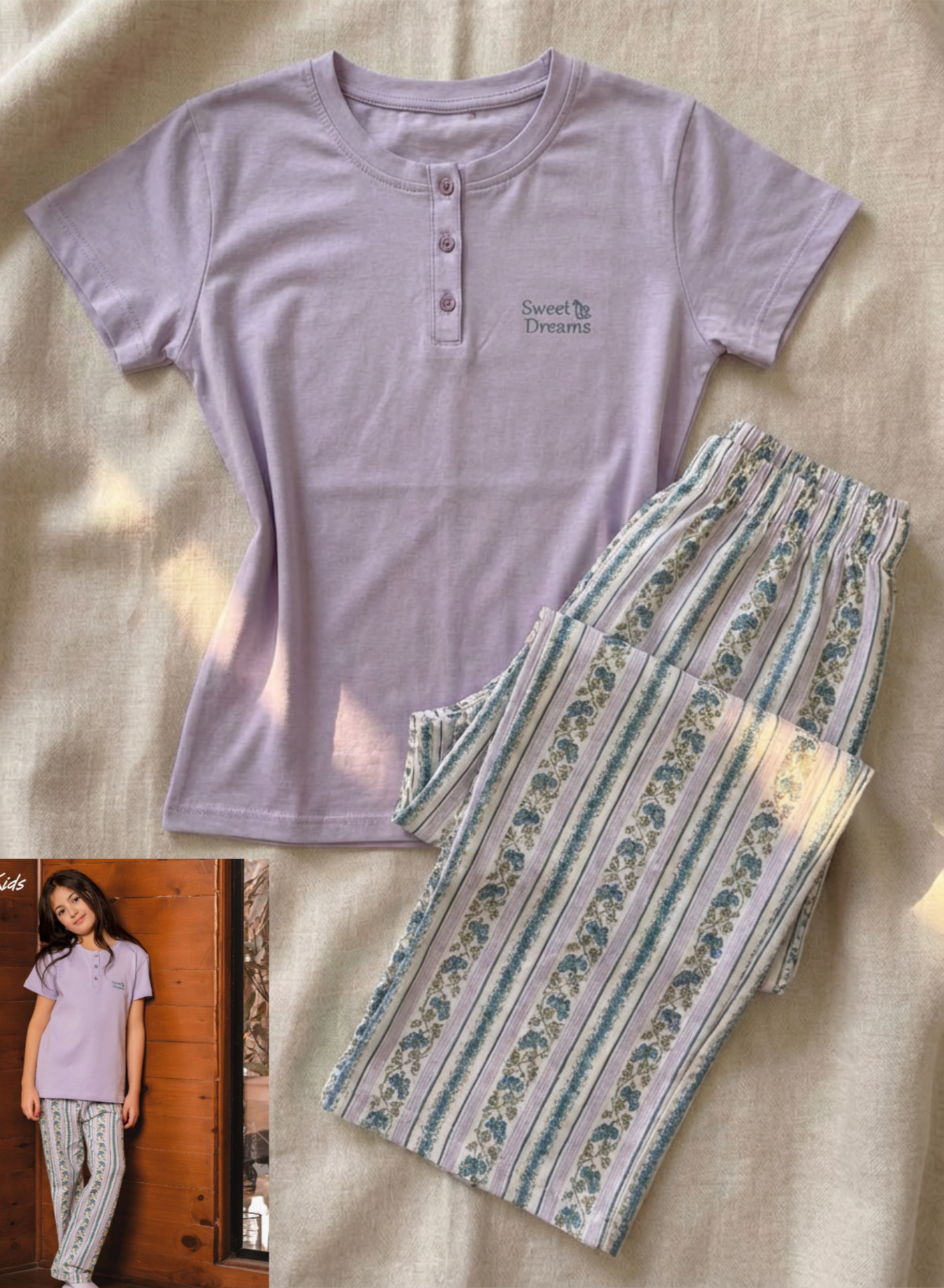 Purple pajama top with 'Sweet Dreams' text and floral-patterned pants on a beige background.